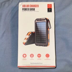 Solar Charger Power Bank - Black & Orange with the charger, clip also included!